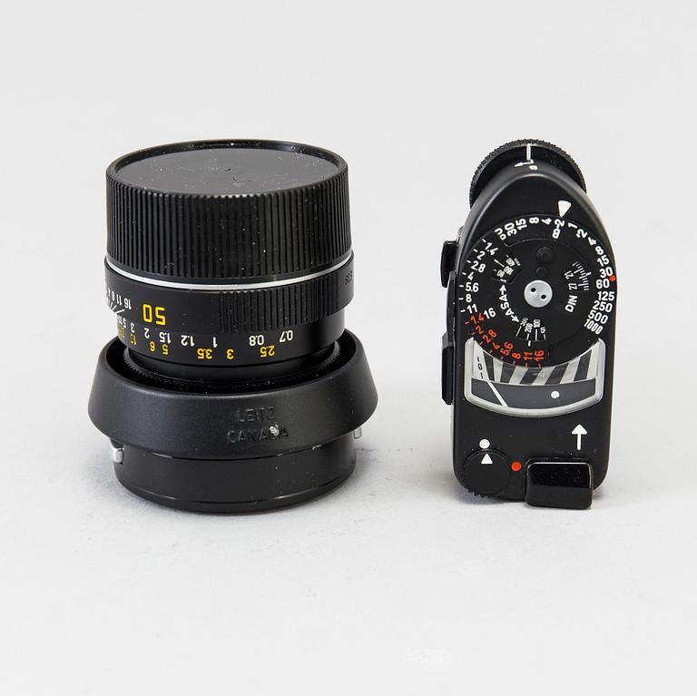 a black body Leica M4-P camera with no 1605951 made by Leitz Canada in 1982. With two lenses and a Leica Meter.