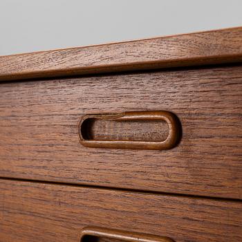 A 1950's teak veneered sideboard.