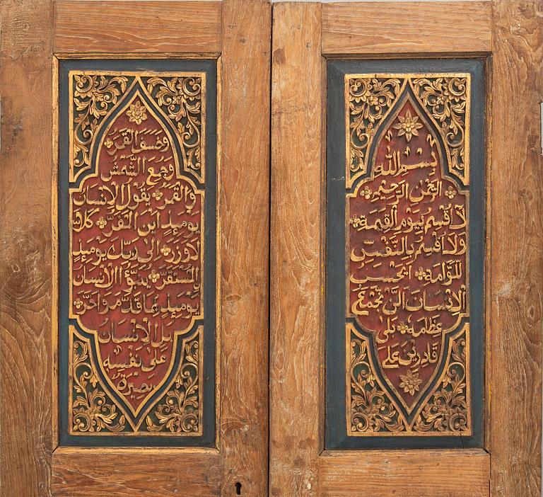 A pair of South East Asian carved wooden doors, presumably Java, 19th Century.