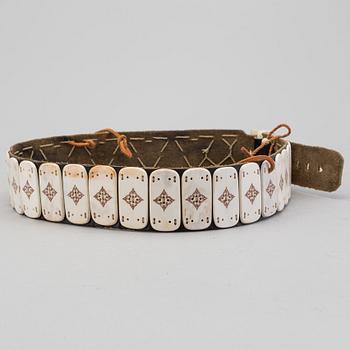 A traditional sami belt probably by Per Anders Nutti. Signed with a monogram.