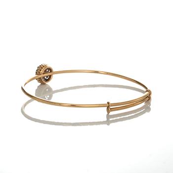 ARMRING, 18 k guld med odlad pärla samt rosenslipade diamanter. Dahlgren, Malmö, 1920. Vikt ca 12 g.