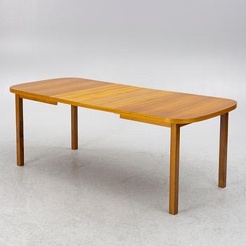 A dining table, 1950s/60s.
