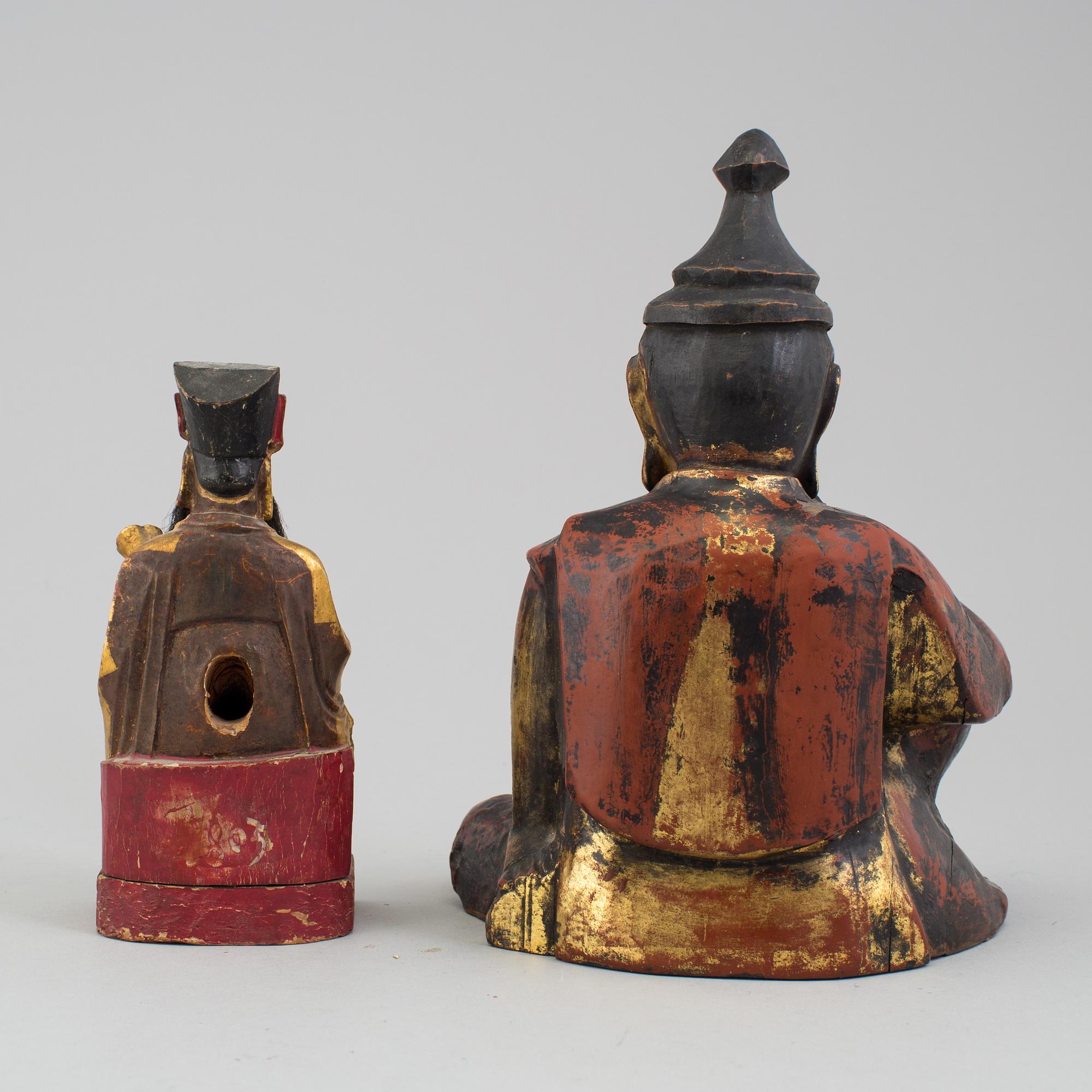 A pair of lacquered wooden deities, late 19th Century.