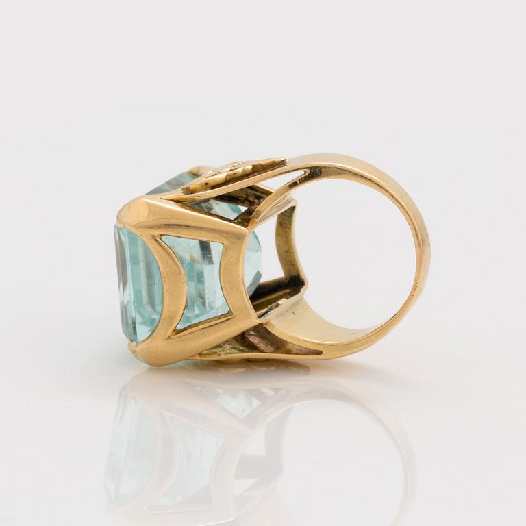 A circa 45.00 ct step cut aquamarine ring.
