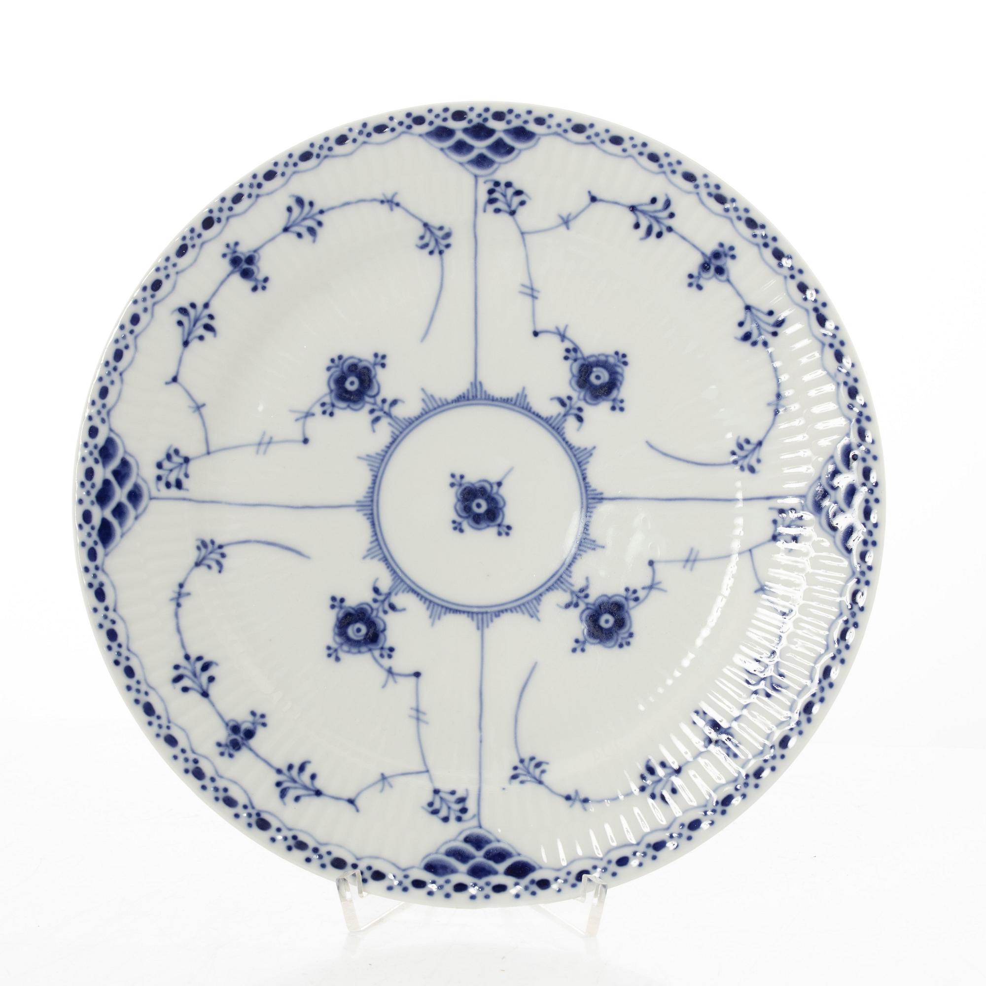 Royal Copenhagen, 35 pieces of a porcelain 'Blue Fluted' half lace dinner service, Denmark, 1889-1978.