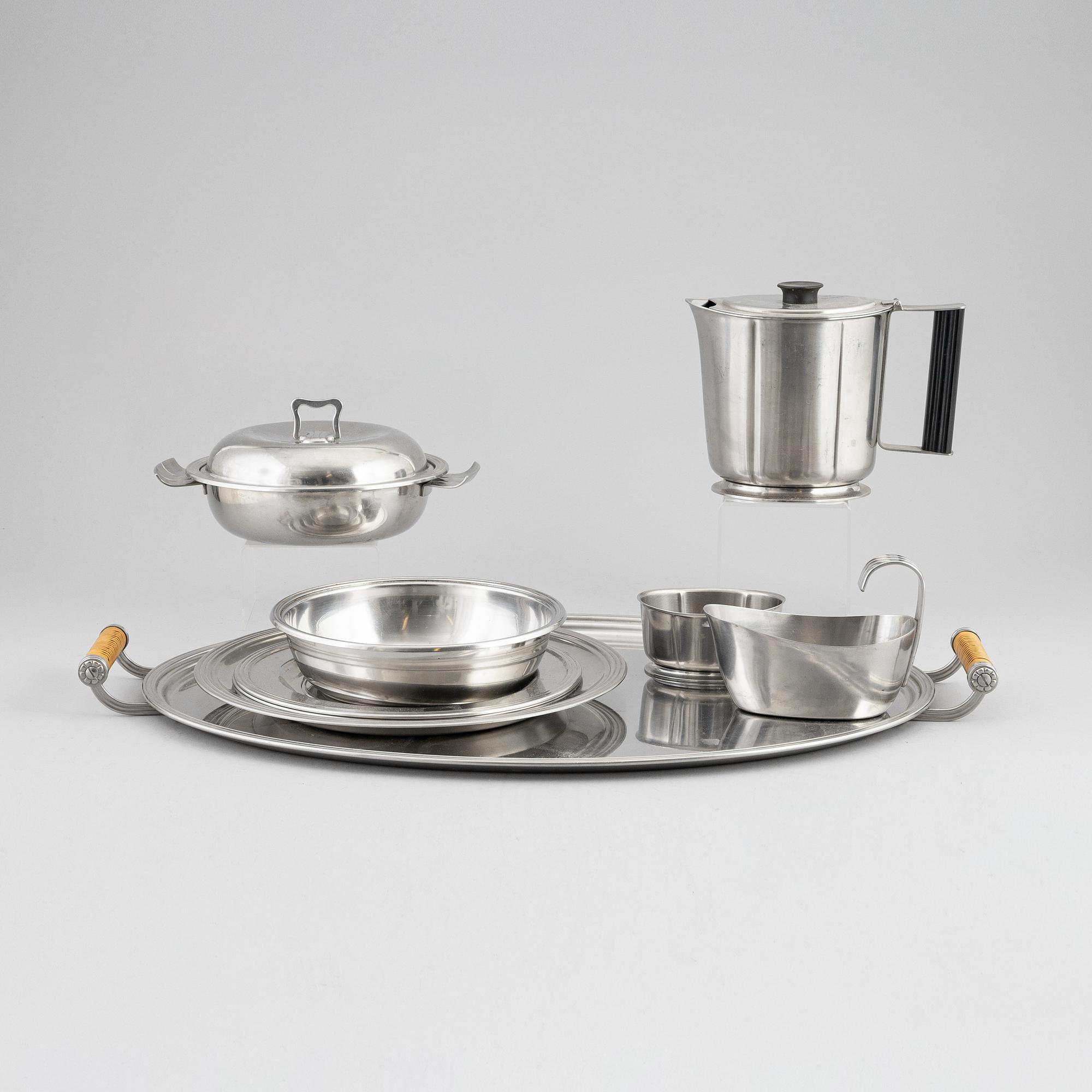Eight stainless steal pieces to the 'Thebe' cutlry/dining service, Folke Arström, Gense, 1950's/60's.
