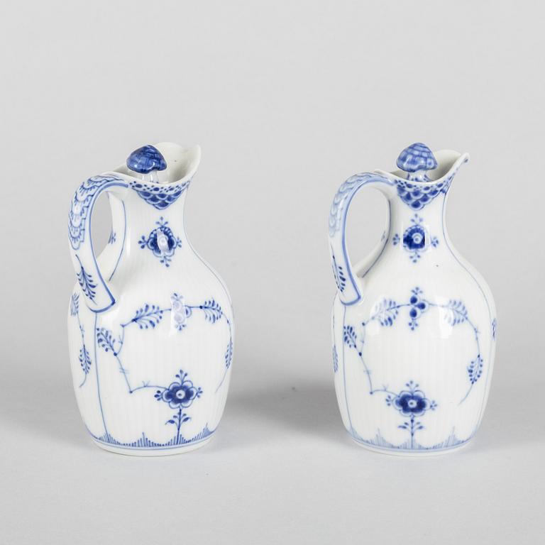 A pair of 'Blue Fluted' porcelain oil and vinegar pitchers and a tray, Royal Copenhagen, models 1179, 1180 and 1195.