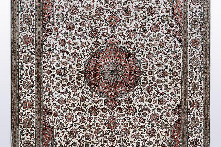 A carpet, silk Kashmir, ca 260 x 172 cm.