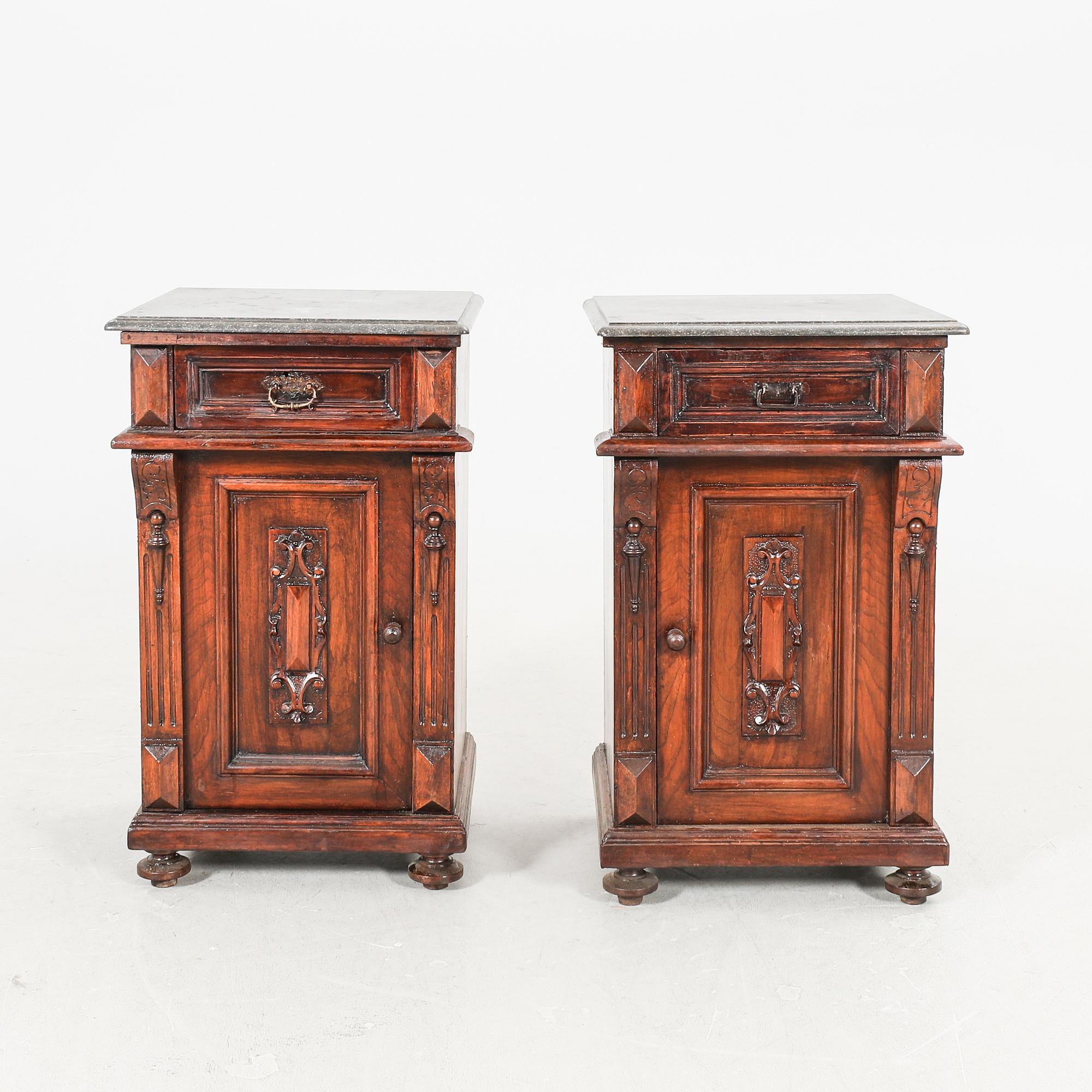 A pair of walnut bedside tables first half of the 20th century.