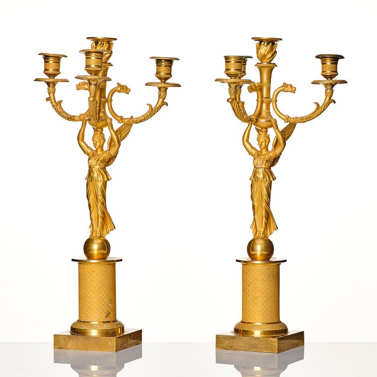 A pair of Empire candelabras for four lights, beginning of the 19th century.