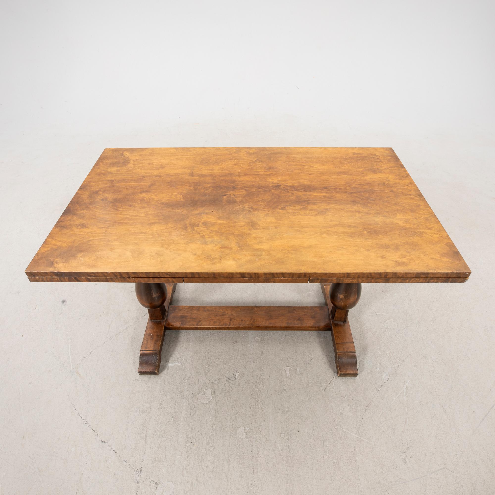 A 1940s birch dining table/library table.