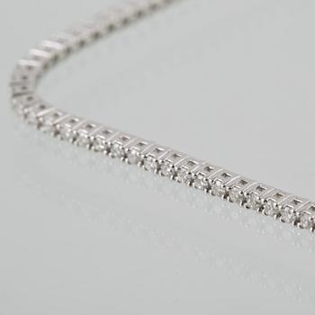 ARMBAND, 18K vitguld med briljantslipade diamanter ca 1.16 ct. Vikt 5,3 gram.