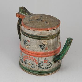 A painted wooden jar from the 19th century.