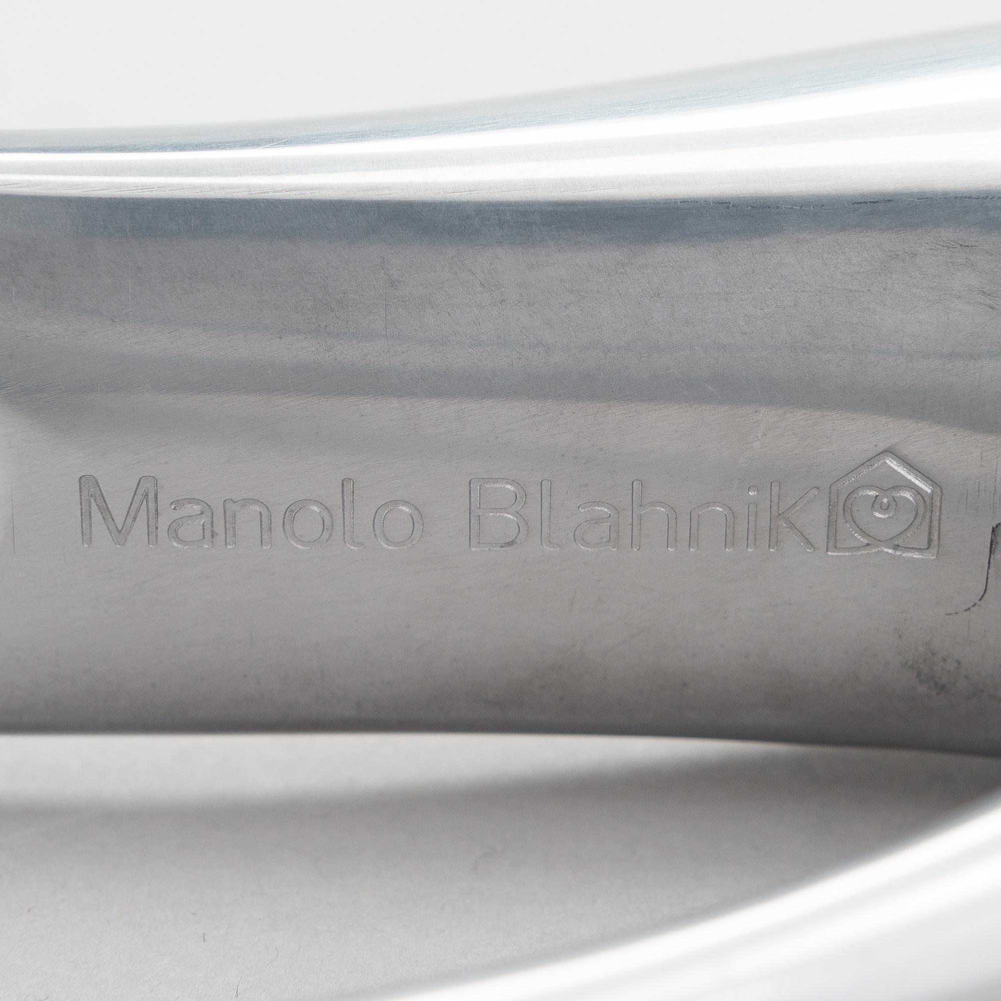 A metal shoe horn by Manolo Blahnik, 2000s.