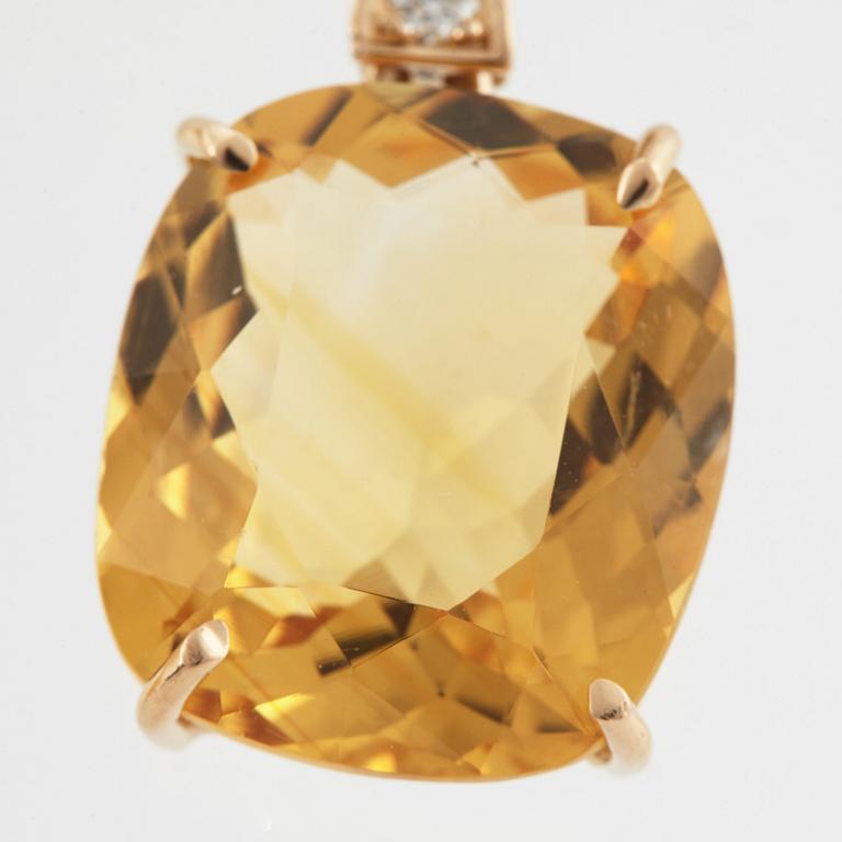 Faceted citrines and diamond earrings.