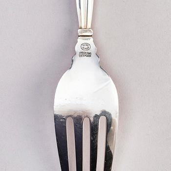 Johan Rohde, a set of 95 pieces of 'Konge/Acorn' sterling silver and stainless steel flatware, Georg Jensen, Copenhagen, post 1945.