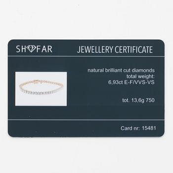 Tennis bracelet in 18K gold with round brilliant-cut diamonds.