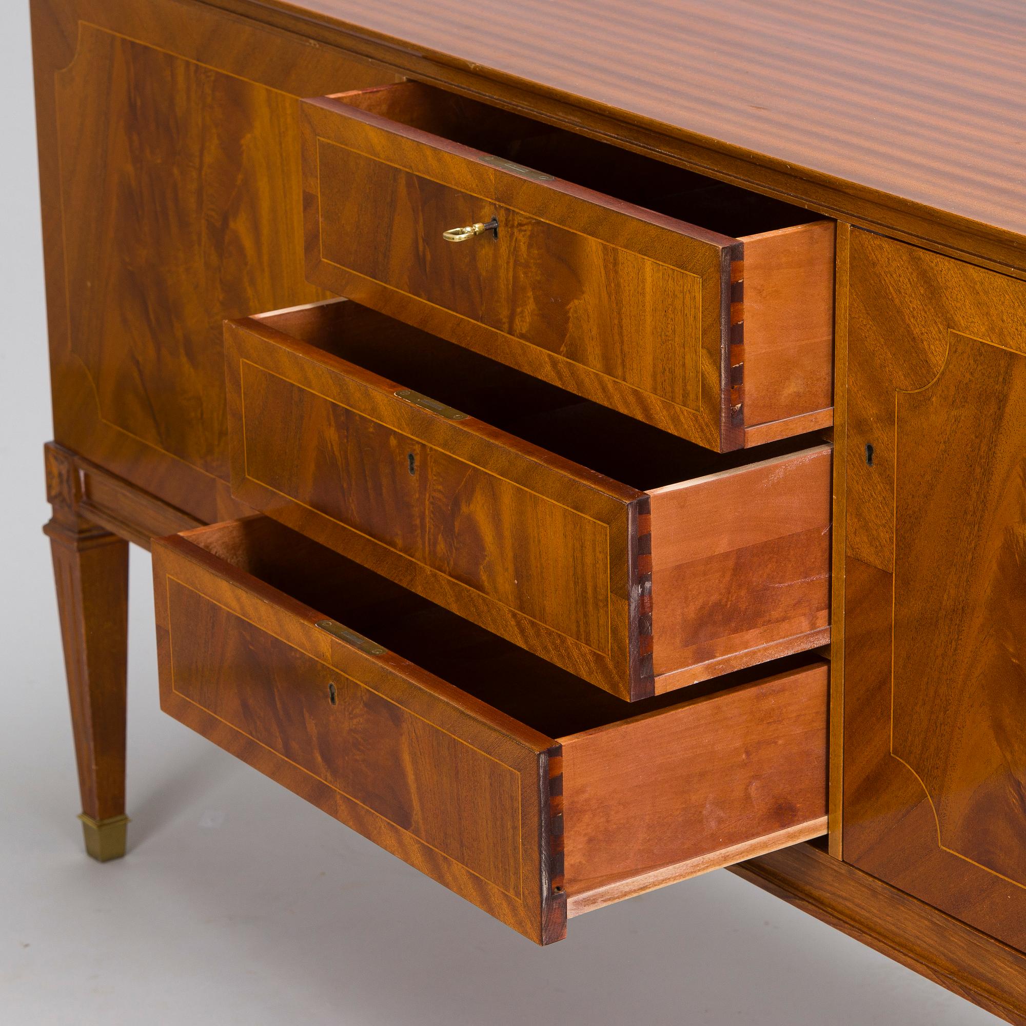 A mid 20th century gustavian style veneered sideboard by Abrahamsons Möbelfabrik AB.