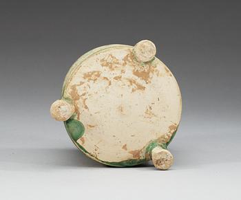 A green and yellow glazed tripod censer, Tang dynasty (618-907).