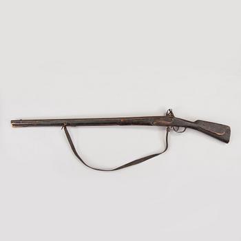 An early 19th century flintlock rifle.
