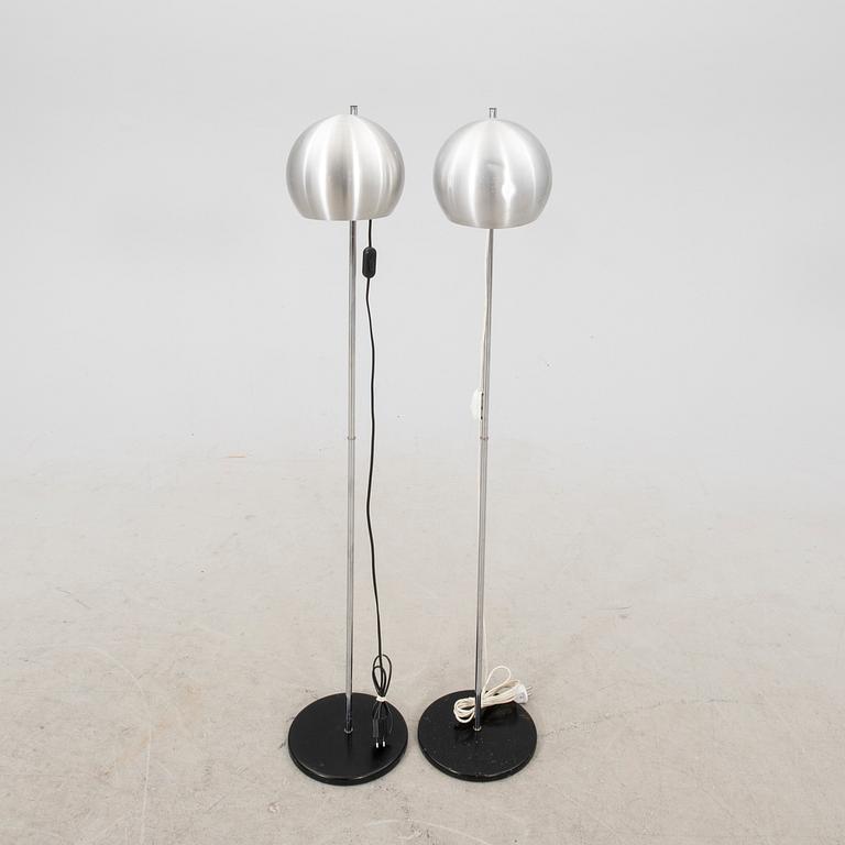 A pair of Heimi steel 1970s floor lamps.