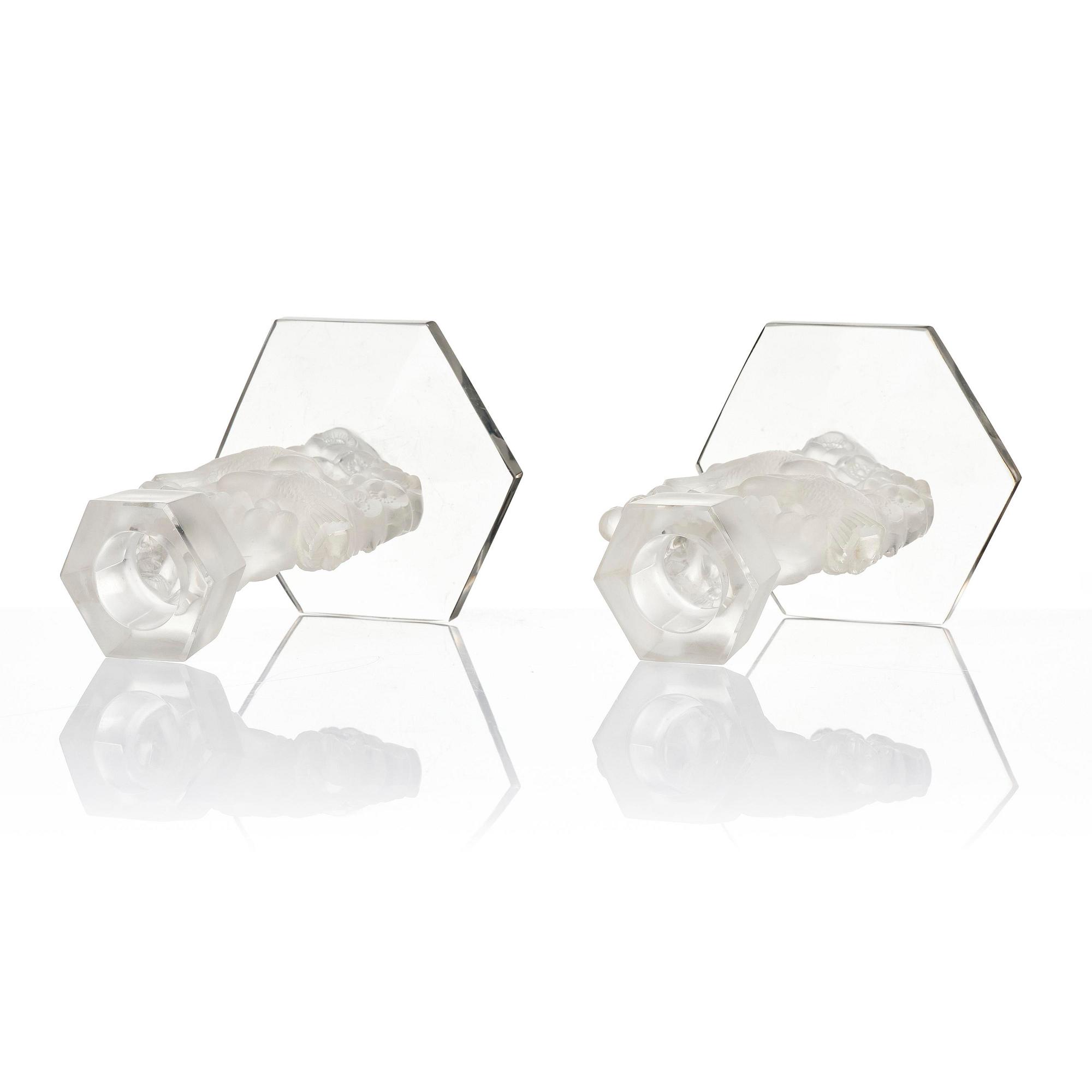 René Lalique, a pair of “Mésanges” cast glass candlesticks, France, post-1943.