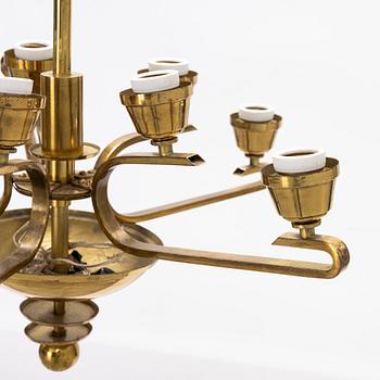A ceiling brass lamp, ca 1930-/40's.