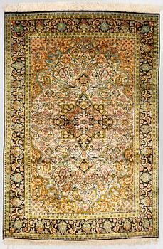 A RUG, silk Qum, ca 210 x 136 cm.