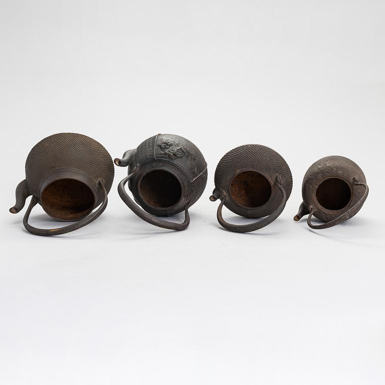 Four Japanese teapots.