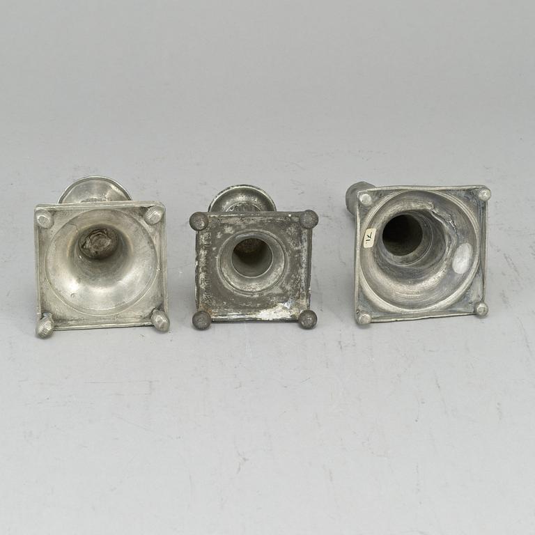 Three 19th century gustavian pewter candlesticks.