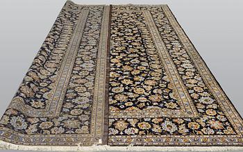 A carpet, Keshan approx. 410 x 310 cm.