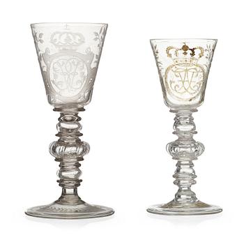 129. Two engraved and cut glass goblets, 18th Century.