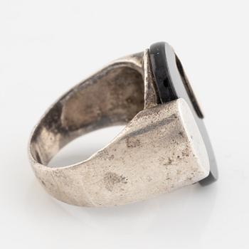 Silver and onyx ring.