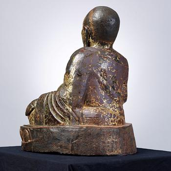 A large seated bronze figure of Budai, Ming Dynasty, dated to the fifth year of Jiajing (1526).