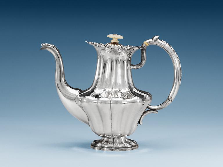 A RUSSIAN PARCEL-GILT COFFEE-POT, makers mark of Adolf Sper, St. Petersburg 1842.