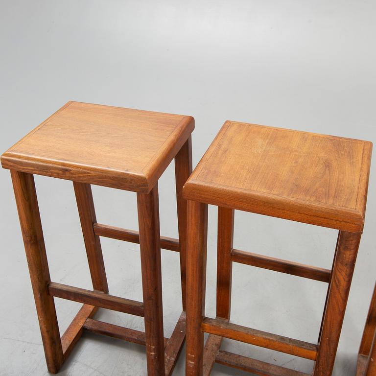 Four bar stools, 20th century.