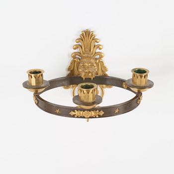 APPLIQUER, för tre ljus, ett par. Frankrike, 1800-talets början. Empire.
