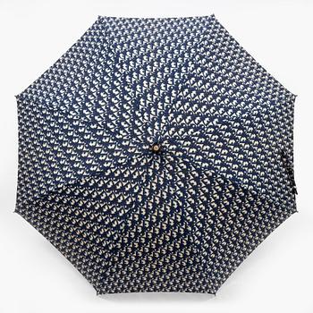 Christian Dior, an umbrella.