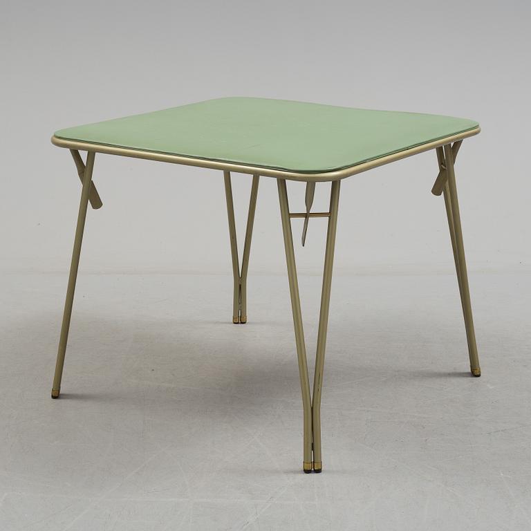 A table and four chairs by Dipetrol, second half of the 20th century.