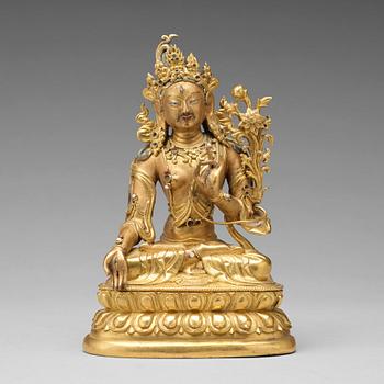 472. A gilt bronze figure of a White Tara, Tibetan-Chinese, 18th Century.