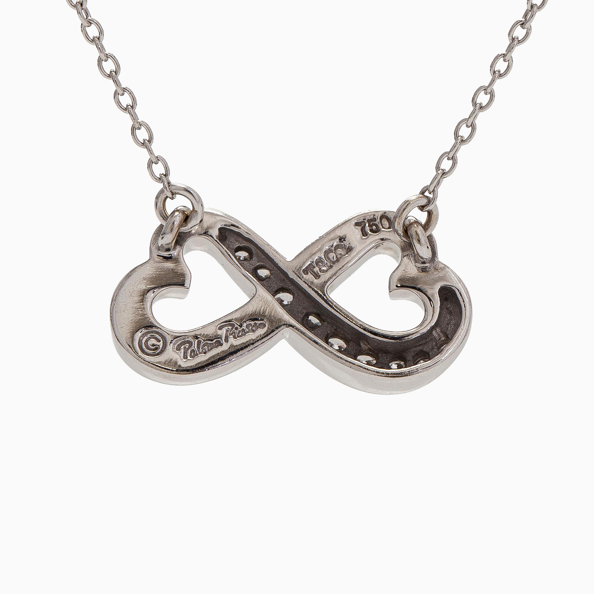 Tiffany & Co, Paloma Picasso, kaulakoru, "Double Loving Heart", 18K valkokultaa ja briljanttihiottuja timantteja.