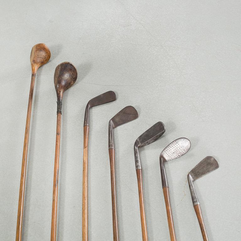 Seven golf clubs with bag, clubs by by "J Winton" & "Josh Taylor",, first half of the 20th century.