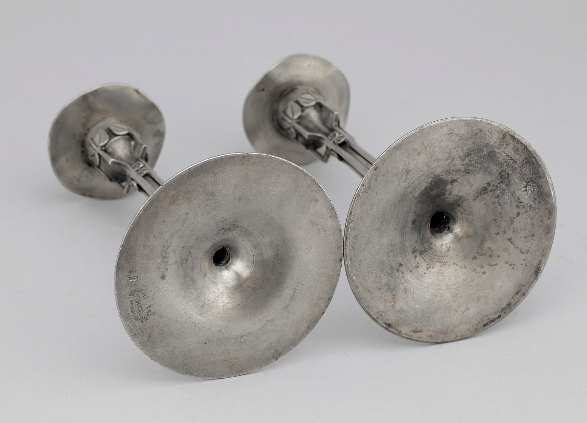 LJUSSTAKAR, ett par, tenn, Jugend, Santessons, Stockholm. Tidigt 1900-tal.