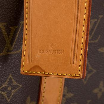 LOUIS VUITTON, a 'Sirius 65' monogram canvas suitcase.