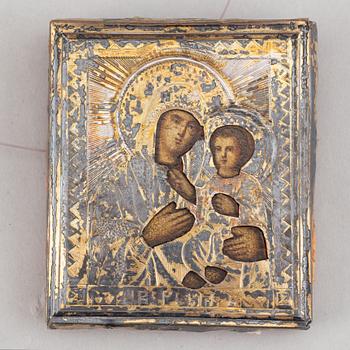 Two Russian 19th century travle icon, oklad in silver and parce-gilt, one with assayer mark AA 1890.