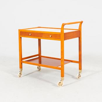 A beech and laminate 'Triva' drinks trolley from Nordiska Kompaniet 1949.
