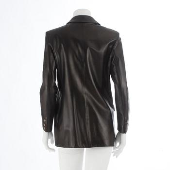 CÉLINE, a dark brown leather jacket.Size 42.