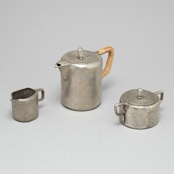 TAGE FOUGSTEDT, a 3 part pewter coffee service, signed and dated 1922.