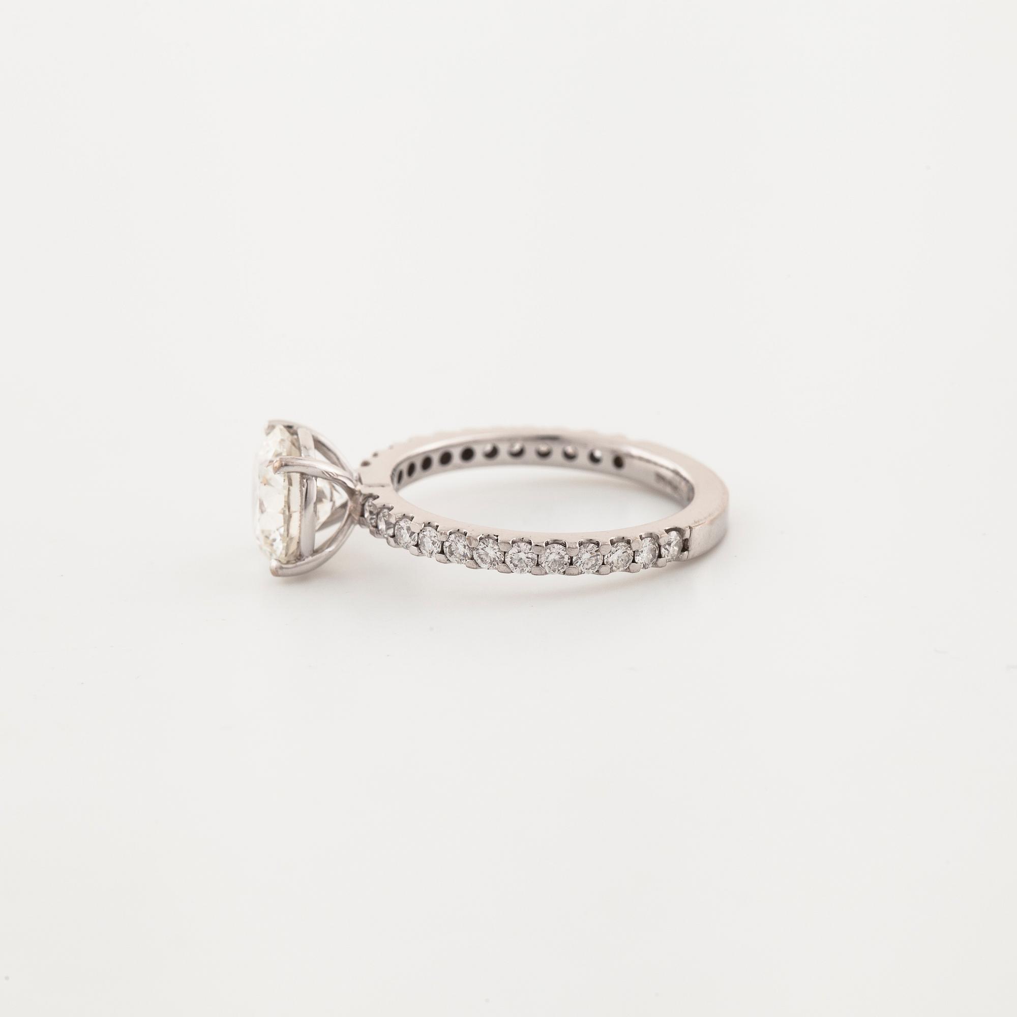 A brilliant cut diamond ring.