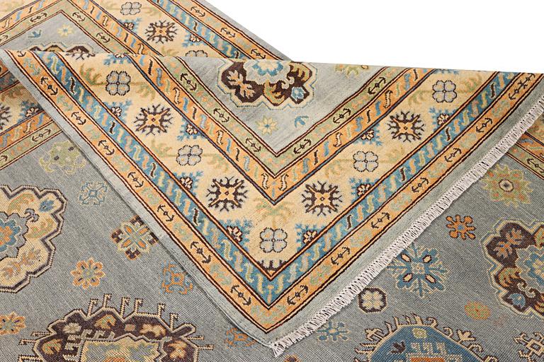 A Kazak carpet, c. 295 x 206 cm.